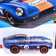 Hot Wheels 1:64 Scale Shelby Cobra Daytona Coupe HW Race Day | Diecast Car Toy for Kids 3+ (Blue)