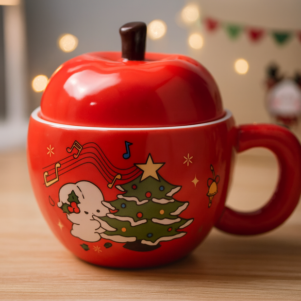 Red apple-shaped ceramic Christmas mug with Santa and Christmas tree design