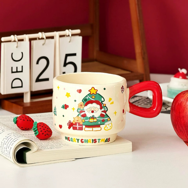"Ceramic Christmas gift mug with Santa topper and spoon"