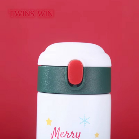 Festive holiday water bottles on red and green background with Christmas banner