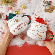 Christmas ceramic mug with red Santa hat lid